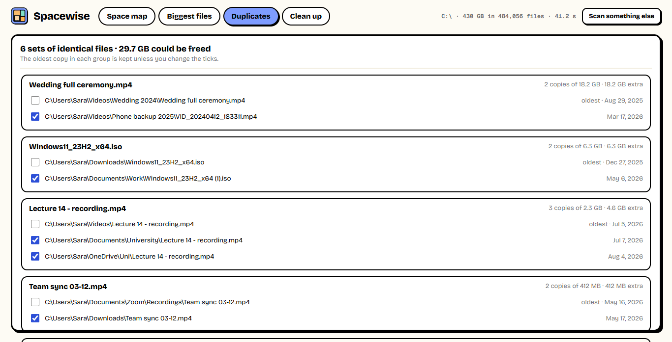 Duplicate files grouped: a wedding video, a Windows ISO and a lecture recording saved more than once